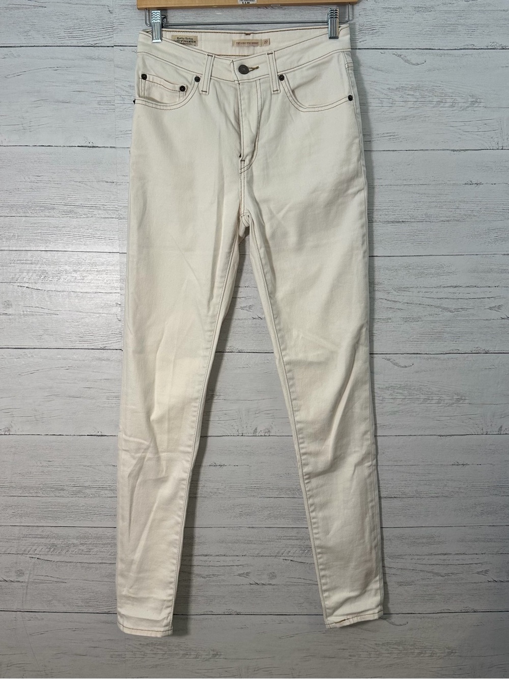 Levi’s high-rise skinny white jeans, size 27